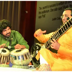 In perfect sync with my Tabla accompanist during a performance at St. Xavier's High School. The communication between the main artist and the percussionist is vital for a captivating performance.