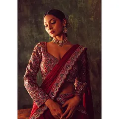 The quintessential Indian bride. I styled this classic red lehenga with full-sleeve embroidery and a delicate choker to create a powerful and timeless statement for the main wedding ceremony.