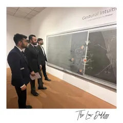 My team and I studying a piece at the "Gestural Intuitions" exhibition. Art, like law, requires careful analysis and interpretation.