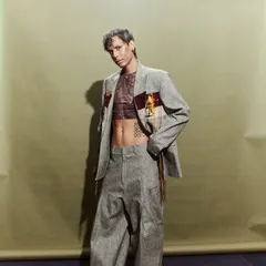 This look for the Huemn show featured a deconstructed suit with a sheer top, playing with tailoring and transparency.