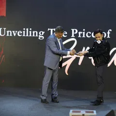Engaging with a senior executive on stage to reveal the price of a new real estate project. Involving key stakeholders in the magic makes the reveal more impactful and memorable for everyone.