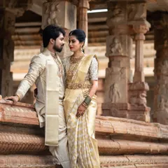 Set against the timeless grandeur of a heritage temple, this portrait is about capturing love that feels as enduring as the stone carvings around them. It's a blend of cultural elegance and a deeply personal connection.