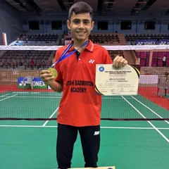 Close-up of Dev with his hard-earned gold medal at the national ranking tournament. This is the result of countless hours of focused practice and drills.