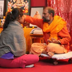 A throwback photo from 2011 shows an early initiation ceremony. This image is a personal reminder of how this path has transformed my own life and the lives of many others over the years.