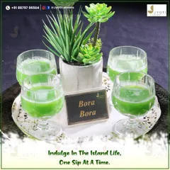 Refreshing 'Bora Bora' mocktails served in elegant glassware, offering guests a vibrant and tropical taste of island life.