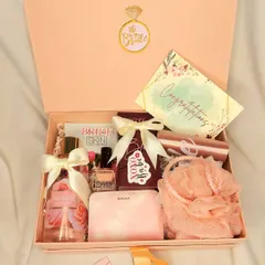 This 'Bride to Be' hamper was curated for a bride who absolutely loves pink. It’s filled with all her favorites, including a sash, perfume, wallet, and chocolates, making it a perfectly personalized gift.