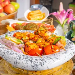 Our paneer tikka is a vegetarian favorite, featuring soft paneer marinated in spices and grilled to perfection with onions and peppers.