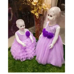 This pair of lavender gowns for sisters shows how I can create age-appropriate versions of a similar design. The younger child's dress has a simple layered skirt, while the older one's is a full-length gown.