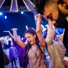 A guest enjoying the music and dancing the night away. I focus on capturing the energy of the entire party, not just the couple.