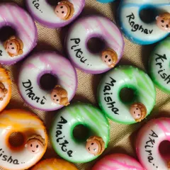 A colorful array of donut soaps, each personalized with a child's name. These are fantastic and unique return favors for birthday parties.