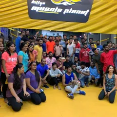 A group photo with our gym family at Kitty's Muscle Planet. This is what it's all about: a community of people committed to their health and fitness goals.