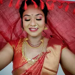 Our advanced bridal makeup course includes detailed training on regional looks, like this traditional South Indian bridal style. Students master techniques for vibrant eye makeup and learn to work with traditional attire and jewelry.