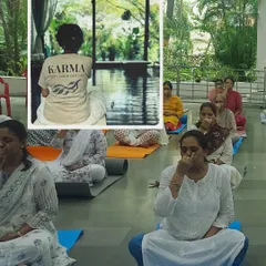 Participants in a workshop practicing Nadi Shuddhi, a preparatory breathing technique. This practice helps to purify the energy channels and calm the mind before moving into deeper asanas.