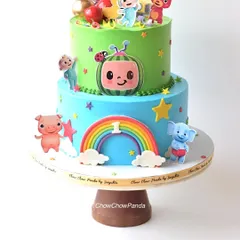 For the little ones who love Cocomelon, I designed this cheerful two-tier cake. The bottom tier features a rainbow and characters, while the top tier brings the whole Cocomelon family together, all made with smooth, delicious buttercream.