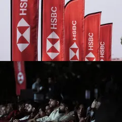 Our collaboration with HSBC is highlighted here, with their branding visible on flags and the audience enjoying the show. We provide prominent visibility for our title sponsors.
