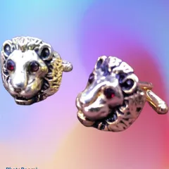 Make a bold statement with these 3D lion head cufflinks. Crafted in an antique gold finish with red crystal eyes, these pieces add a touch of power and regality to a formal shirt.