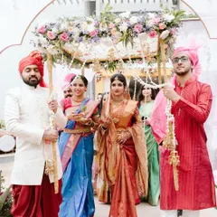 The bride's entry is always a magical moment. I loved creating this delicate 'phoolon ki chaadar' with a canopy of pastel flowers and hanging jasmine strings for her walk down the aisle.