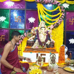 A priest performing the puja during our Ganesh Chaturthi celebration, an important cultural event at Sangeet Gurugriha.