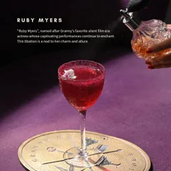 This is the Ruby Myers, a tribute to one of my favorite silent film stars. It's a captivating libation with a hint of floral allure, served with a dramatic spritz of perfume.