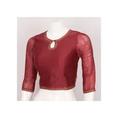 I specialize in delicate details, like this maroon blouse featuring sheer sleeves and an elegant keyhole neckline. The fine embroidery along the neck and cuffs adds a touch of sophistication, making it an ideal choice for party wear or festive events.