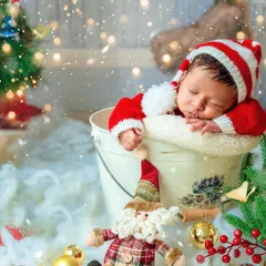 Another adorable shot of this sleeping Santa baby, capturing the peacefulness of a newborn.