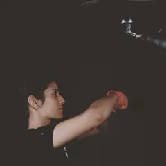 Training here builds more than just physical strength; it builds mental fortitude. This is the focused, determined look of a woman who is pushing her boundaries and discovering her own power.