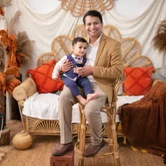 Our autumn boho theme. This setup features warm, earthy tones of orange and brown, with pampas grass and rattan furniture, creating a cozy and rustic feel.