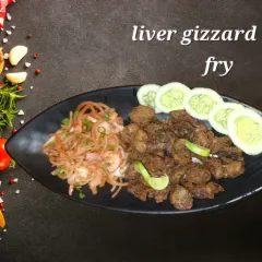 A popular and savoury starter, our Liver and Gizzard Deep Fry. The pieces are marinated in spices and fried until crisp, served with a side of fresh salad.