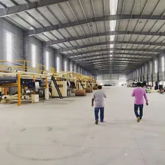 We also undertake large-scale industrial projects. This photo shows the vast interior of a manufacturing facility during its final stages of setup, a space designed for efficiency, scale, and workflow optimization.