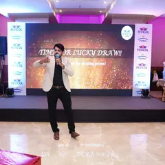 Announcing the lucky draw segment during the Fevicol event. I can seamlessly transition from formal presentations to more exciting segments like prize distributions, keeping the momentum going.