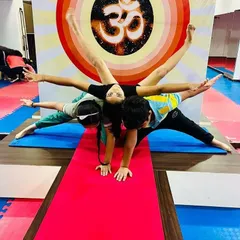 Another wonderful group pose from our kids' yoga session. These activities help develop communication and cooperation skills alongside physical strength.