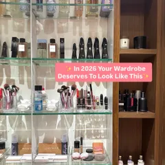 We utilize vertical space in a vanity cabinet with glass shelves and clear organizers. This system is perfect for storing perfumes, makeup brushes, and skincare products.