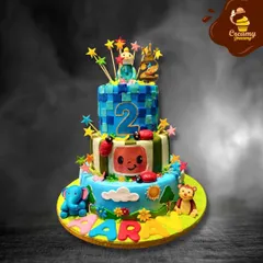 This three-tier Cocomelon cake is a burst of color and fun. It combines different patterns and characters from the show, including JJ and the iconic watermelon TV, making it a dream come true for any young fan.