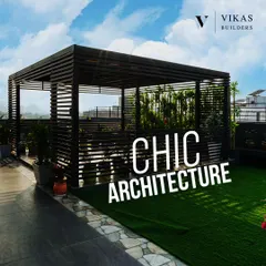 Chic architecture defines this rooftop terrace. We designed a modern pergola that provides shade and structure, creating a perfect spot for outdoor dining and lounging.
