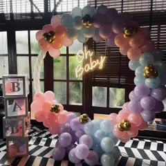 A modern and soft baby shower theme using pastel balloons in pink, purple, and blue. The circular arch, "Oh Baby" neon light, and "BABY" blocks create a beautiful and stylish photo opportunity for the parents-to-be.