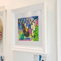 The Henri Matisse lithograph, 'La Tristesse du Roi,' hanging in our gallery. We are proud to feature works from such an influential artist, known for his original and fluid use of color.