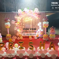 A magical unicorn theme for a first birthday in Palghar. We used pastel-colored balloons, unicorn-topped pillars, and foil balloon letters to spell out the birthday girl's name, creating a whimsical and dreamy atmosphere.