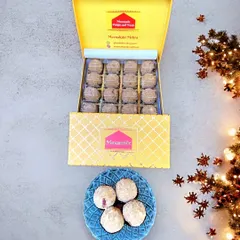 A full box of my Panjiri Ladoos, packed and ready for you. Each ladoo is a ball of warmth and health, made with roasted wheat flour, nuts, and pure ghee.