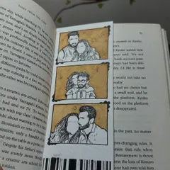 A close-up of a custom photo strip bookmark, tucked inside a book. I love how the warm coffee tones look against the pages. This one captures a couple's special moments.