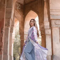 This shot captures the movement of the jacket, adding a dynamic element to the portrait and highlighting the garment's design.