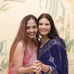 A happy moment with a student on graduation day. Seeing them confident and ready to start their careers is my greatest joy.
