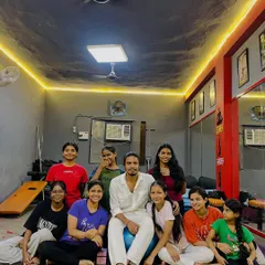 A happy moment with my students on Teacher's Day. The bond we share goes beyond the yoga mat.
