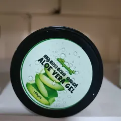 A top-down view of the Aloe Vera Gel jar. The simple, clean packaging reflects the pure and natural product inside.