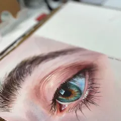 A close-up of an eye painted in watercolor from an online session. Every tiny detail, from the eyelashes to the iris reflections, is a lesson in patience and layering.