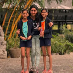 A happy moment with two of our young students. We aim to be mentors and positive role models in their fitness journey.