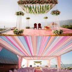 A breathtaking view of the wedding mandap set against the hills of Satara, alongside the colorful tent setup for the guests.
