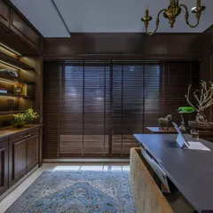 A home office that blends modern functionality with timeless English study vibes. For this Mumbai duplex, I used rich dark wood veneer and a vintage-inspired aesthetic to create a space that is both sophisticated and inspiring.