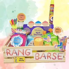 Celebrate Holi with our vibrant 'Rang Barse' hamper. This wooden crate is packed with thandai, organic colors, water guns, and lots of festive snacks.