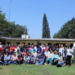A group photo of the IBM team after their inspiring Equine Assisted Learning session. Our programs are designed to empower teams and help them rediscover their potential in a unique, natural setting.