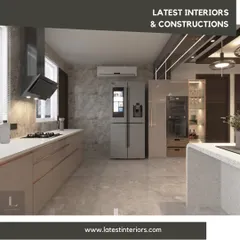 The kitchen is the heart of the home, and I design them to be both beautiful and highly functional. This open-plan kitchen features handleless cabinetry, a smart refrigerator, and an integrated breakfast counter, perfect for modern family life.